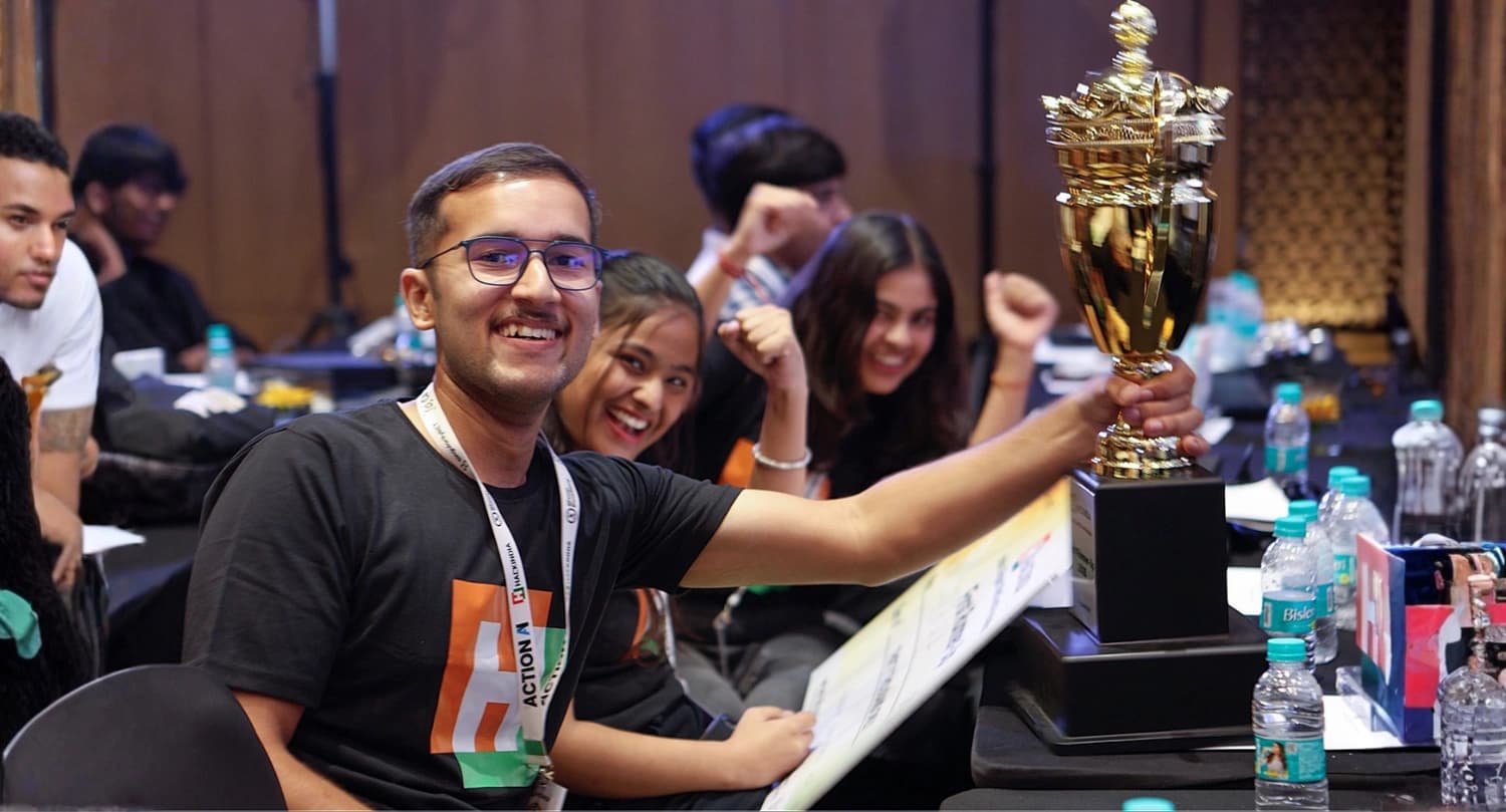 HackIndia winners celebrating with the trophy