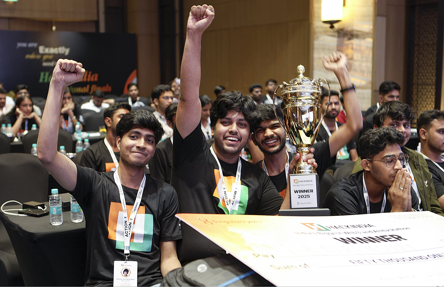 HackIndia 2025 winners celebrating with trophy